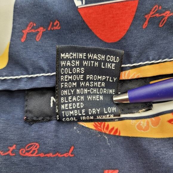 Nautica Blue and Tan Swim Trunks with Surfboard Pattern - Picture 6 of 8